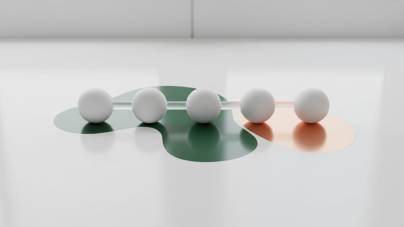 Illustration: A linear arrangement of five white molecular model spheres on a white surface with green and copper.