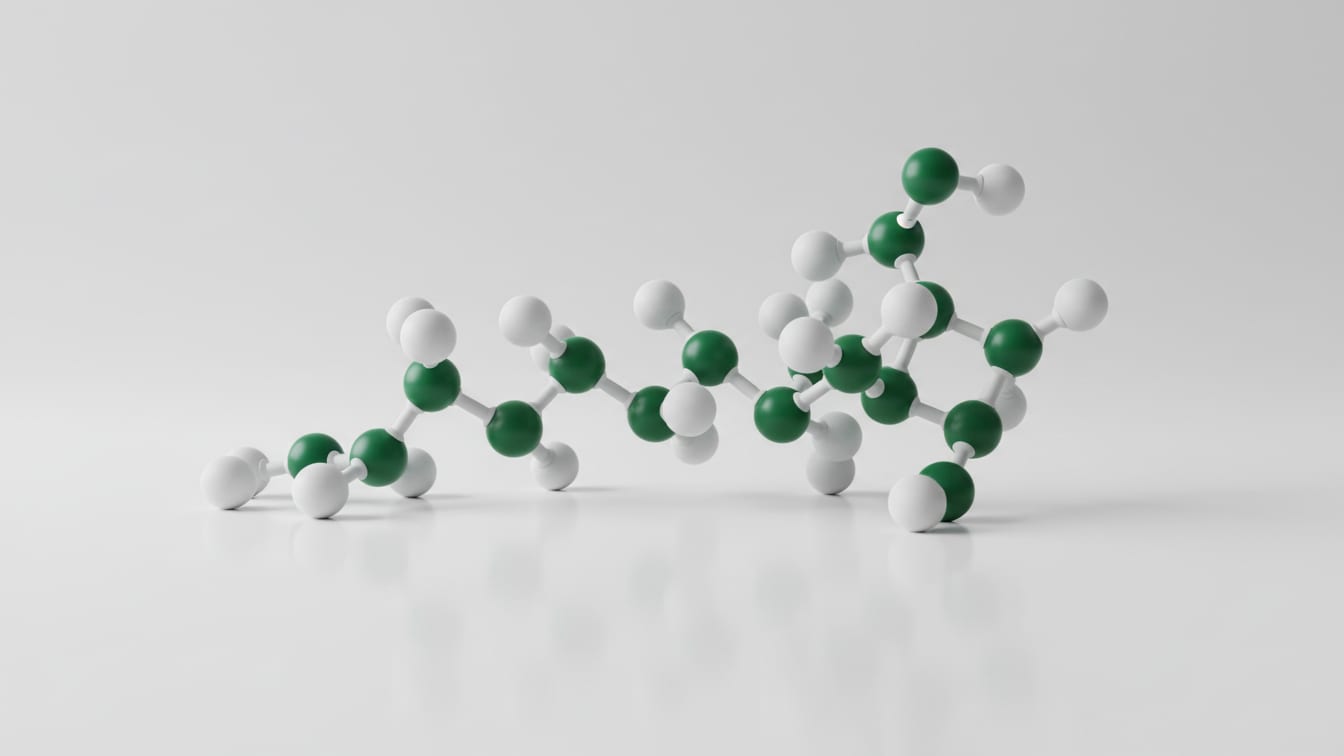 Illustration: A molecular model of a peptide chain in white and deep green on a white surface with copper reflections.